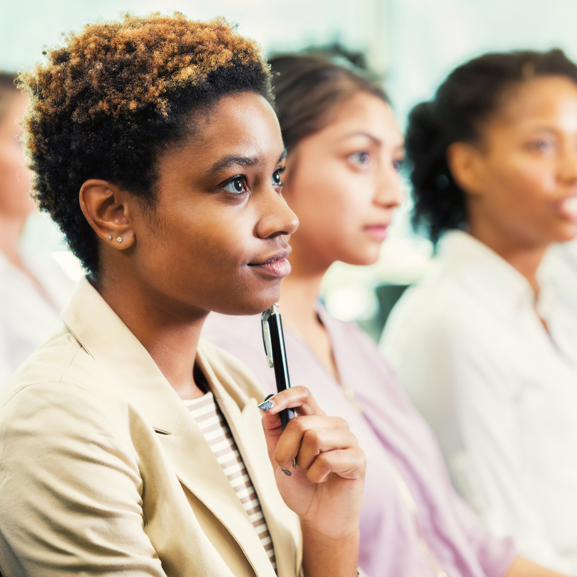 Attractive young woman during business conference